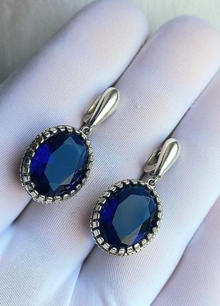 Серебряные серьги синий камень циркон8 фото