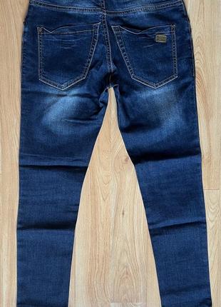 Женские джинсы 25р2 фото
