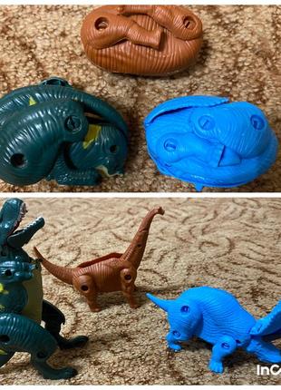 Набор из трех динозавров-трансформеров, собираются в яйца