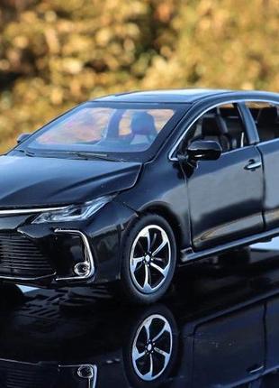 Модель автомобиля toyota corolla масштаб: 1:32. игрушечная машинка тойота королла черная (звук, свет).