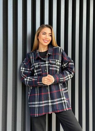 Жіноча синя кашемірова сорочка у клітинку