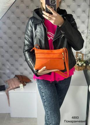 Жіноча сумка кросс боді середнього розміру з еко шкіри на 4-ри відділення (кишені)10 фото