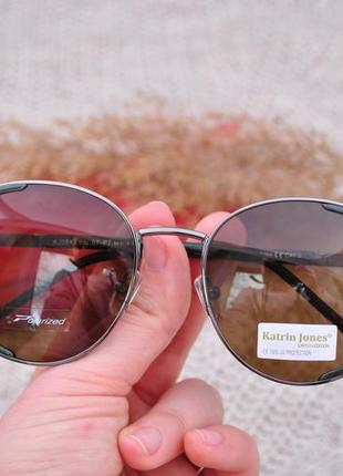 Фирменные солнцезащитные круглые очки katrin jones polarized с боковой шорой3 фото