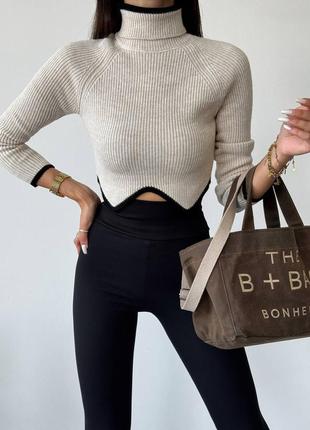 Cвитер женский под горло с асимметричным низом разм.s/m