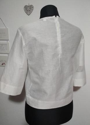 Фирменная стильная белая базовая блузка с прозрачными вставками2 фото