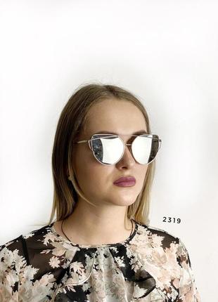 Солнцезащитные очки, цвет серый в серебристой оправе1 фото