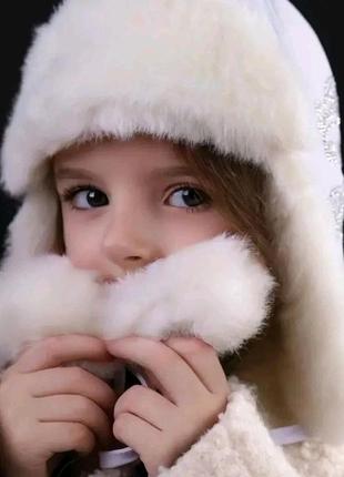 Дитяча зимня шапка ушанка з помпонами7 фото