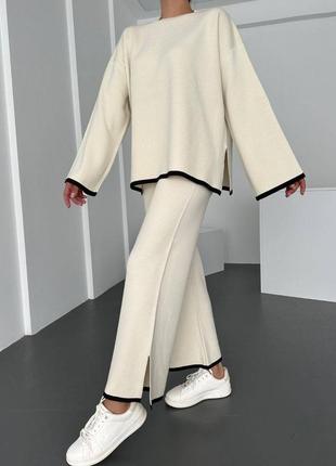 Трендовий костюм оверсайз джемпер з рукавами кльош розрізами широкі брюки з високою посадкою на резинці светр палаццо7 фото