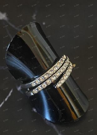 Тройное кольцо спираль с фианитами, серебряного цвета.2 фото