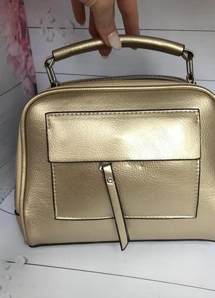 Модная женска сумка золотистого цвета5 фото