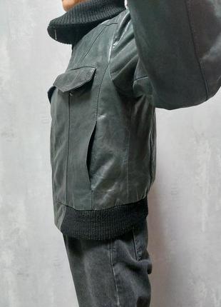 Куртка кожаная, размер l, черного цвета, размер плеча 12 см, руковая 66 см, спина 42 см, длина 56 см.3 фото
