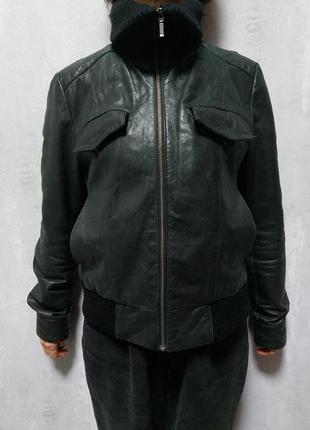 Куртка кожаная, размер l, черного цвета, размер плеча 12 см, руковая 66 см, спина 42 см, длина 56 см.4 фото