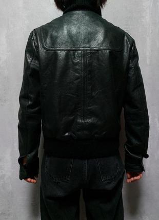 Куртка кожаная, размер l, черного цвета, размер плеча 12 см, руковая 66 см, спина 42 см, длина 56 см.5 фото