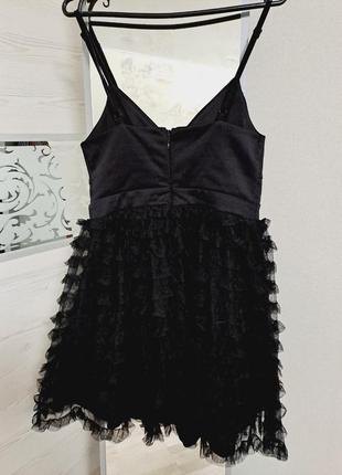 Маленькое черное платье с пышной юбкой4 фото