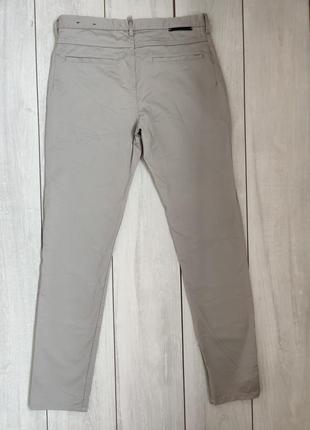 Якісні чоловічі брюки штани світло-сірого кольору 32 р пояс 42 см турція7 фото