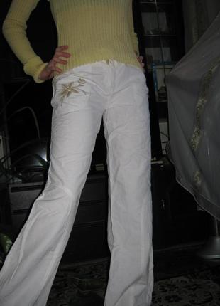 Летние белые женские брюки с  вышивками  б/у размер .46-481 фото