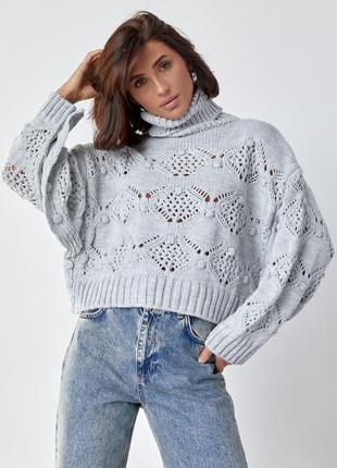 Ажурний светр із застібкою з боків
