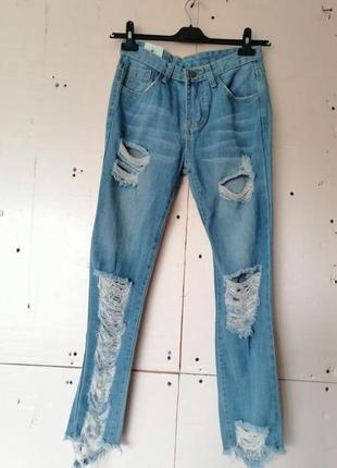 Стильные рваные коттоновые джинсы2 фото