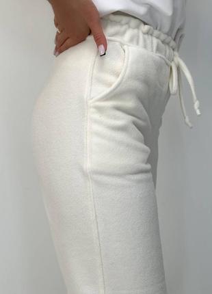 Штаны теплые прямые талия на резинке с шнурком боковые карманы низ манжет ткань флис2 фото