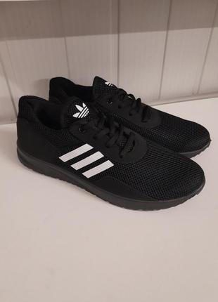 Кроссовки мужские черные с белым adidas т-4998. размеры: 41,42,43,44,45.