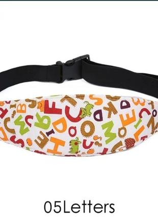 Фіксаьор, тримач голови дитини в автокріслі