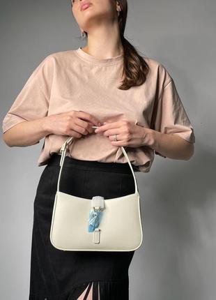 Молодежная сумка известного бренда yves saint laurent hobo  в светлом бежевом цвете натуральная кожа лоран4 фото