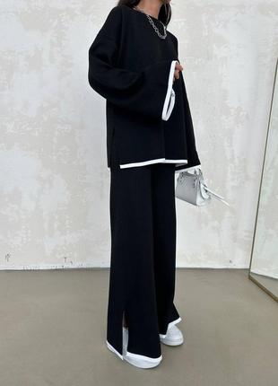 Жіночий чорний стильний трикотажний костюм 2023 весна сінь