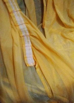 Тюль жовтого кольору нова, під крючки 2 відрізи загальна ширина 9,3 метри