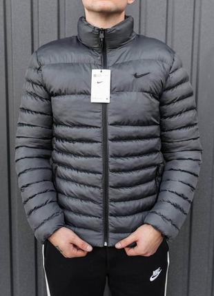 Лёгкая серая стёганная куртка пуховик на эвро зиму nike серая мужская куртка на евро зиму nike