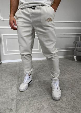 Белые утепленные спортивные мужские штаны1 фото