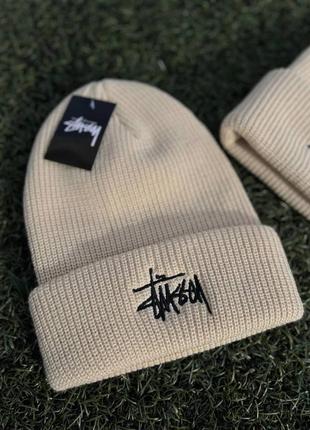 Шапка stussy бежева чоловіча / жіноча