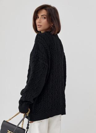 Вязаный свитер оверсайз с узорами из косичек2 фото
