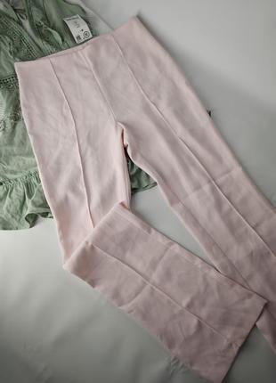 Світло-рожеві кльош штани orsay1 фото