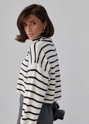 Укорочений жіночий светр у смужку оверсайз.3 фото