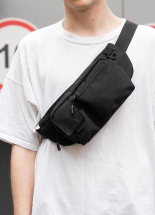 Качественная и надежная тактическая сумка-бананка из прочной и водонепроницаемой ткани черная через плечо1 фото