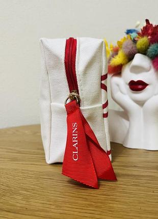 Оригинальный косметичек clarins2 фото