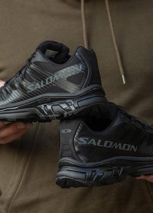 Чоловічі зимні кросівки salomon xt-4 advanced black3 фото