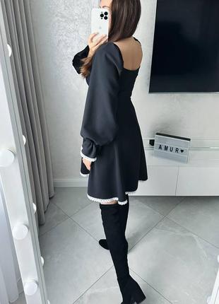 Стильное трендовое платье с широкой юбкой и объемными рукавами6 фото