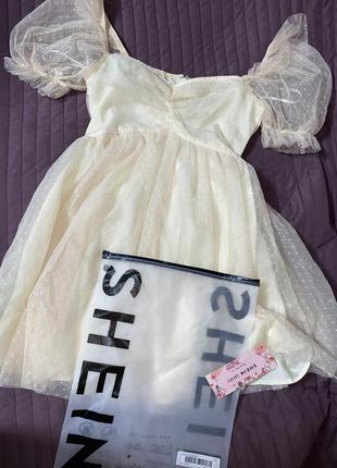 Фатінова сукня з пишними рукавами shein молочного кольору.1 фото