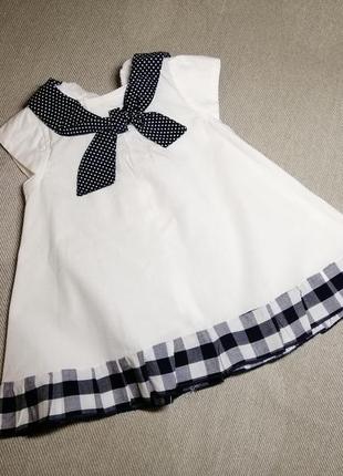 Очень миленькое фирменное платьеце на малышку.