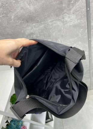 Універсальна непромокаюча сумка-рюкзак nike, puma, the nord face, new balance7 фото