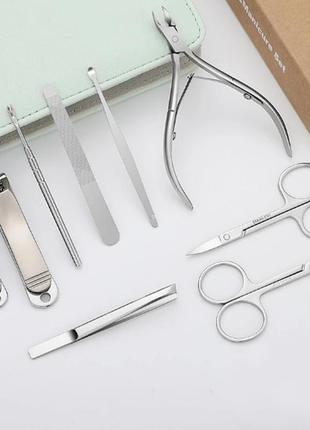 Набір для манікюру та педикюру з нержавіючої сталі у сумці 9 предметів makeup kit&manicure set коричневий4 фото