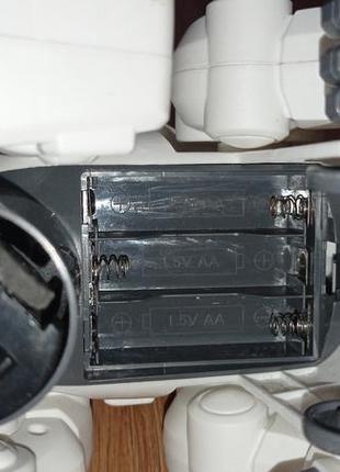 Іграшка музичний динозавр на батарейках7 фото