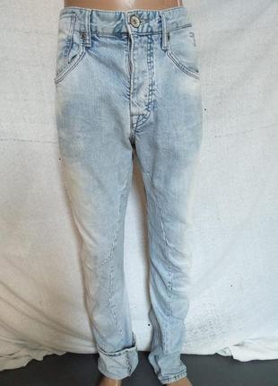 Оригінальні фірмові джинси з щільної тканини.2 фото