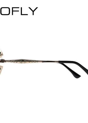 Екстравагантні круглі окуляри зі шорами в металевій оправі3 фото