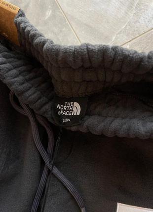 Теплі штани the north face2 фото