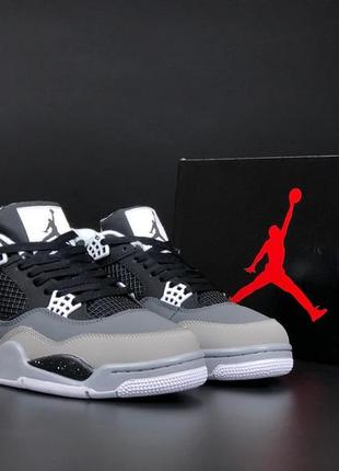 Зимние мужские кроссовки nike air jordan 4 retro winter black grey fur черного с серым цветов с мехом3 фото