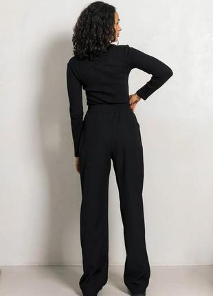 Зручні класичні брюки широкі на резинці зі стрілками 44-52 розміри різні кольори чорні3 фото