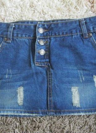 Рвана джинсова спідниця