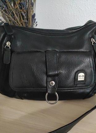 Черная стильная сумка, очень вместительная, материал качественная экокожа2 фото